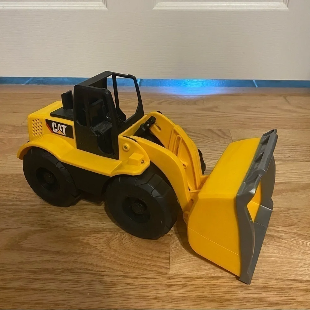 Caterpillar Job Site Machine Wheel Loader Moving Button Activated Up and Down